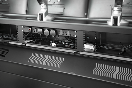 Visionline XT3 sleek, modular desk system for command and control rooms: AV control rooms; Network Operation Centres (NOC); Security Operation Centres (SOC). This image shows the back of the console where panels allow you to manage cables and equipment discretely.