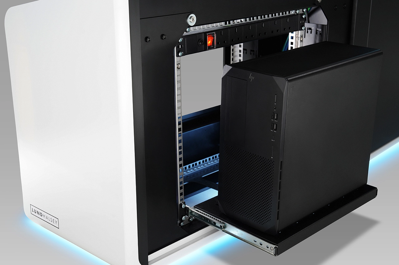 LundHalsey Optima Control Room Console with blue lighting accents and PC pull out tray. PC PULL OUT TRAY
